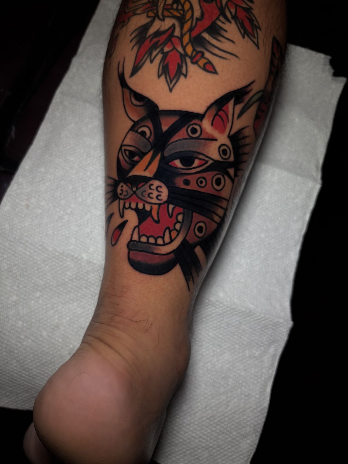 Color traditional cat head tattoo by Ulises Malavé