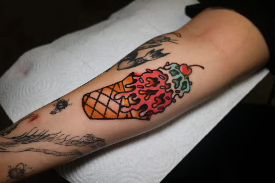 Melting ice cream cone, color traditional tattoo by Ulises Malavé