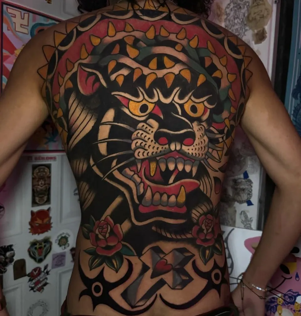 Panther head full back piece, American traditional tattoo by Ulises Malavé