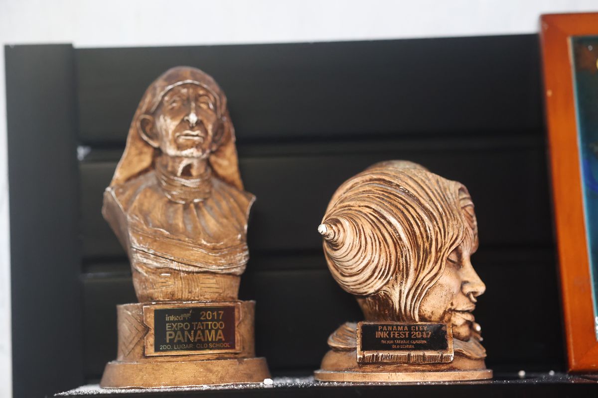 Bronze trophy busts from Panama tattoo conventions